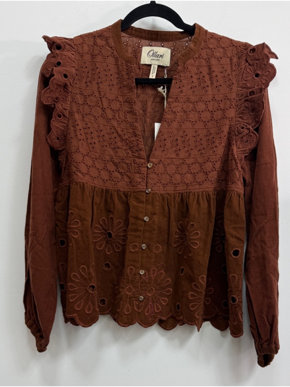 Ollari Women’s Rust Brown Eyelet Ruffle Peasant Top, NWT, size small.